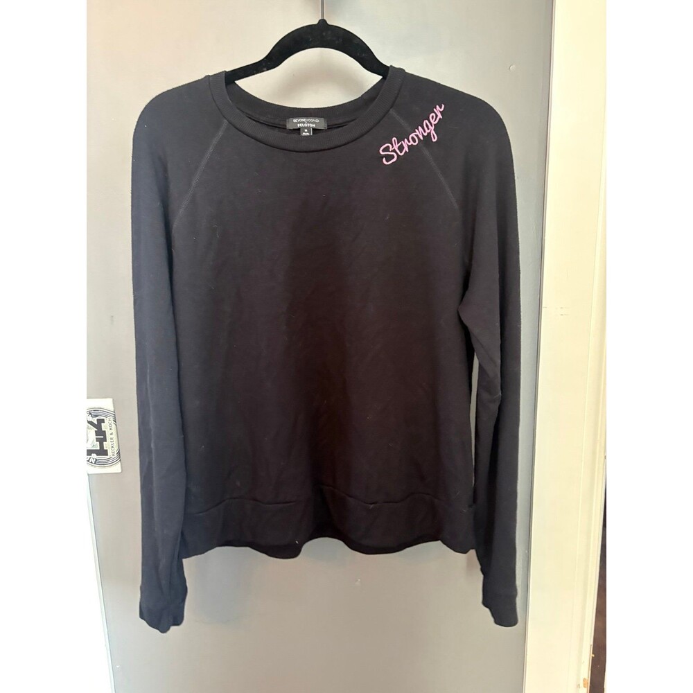 Beyond yoga peloton women’s size M Medium black sweatshirt.